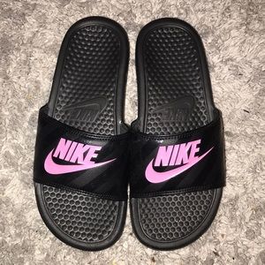 Black and pink NIKE slides